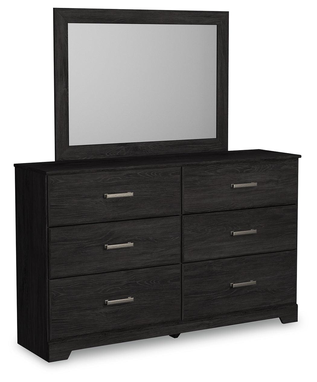 Angled closed drawers of Belachime Black dresser showing finish and hardware