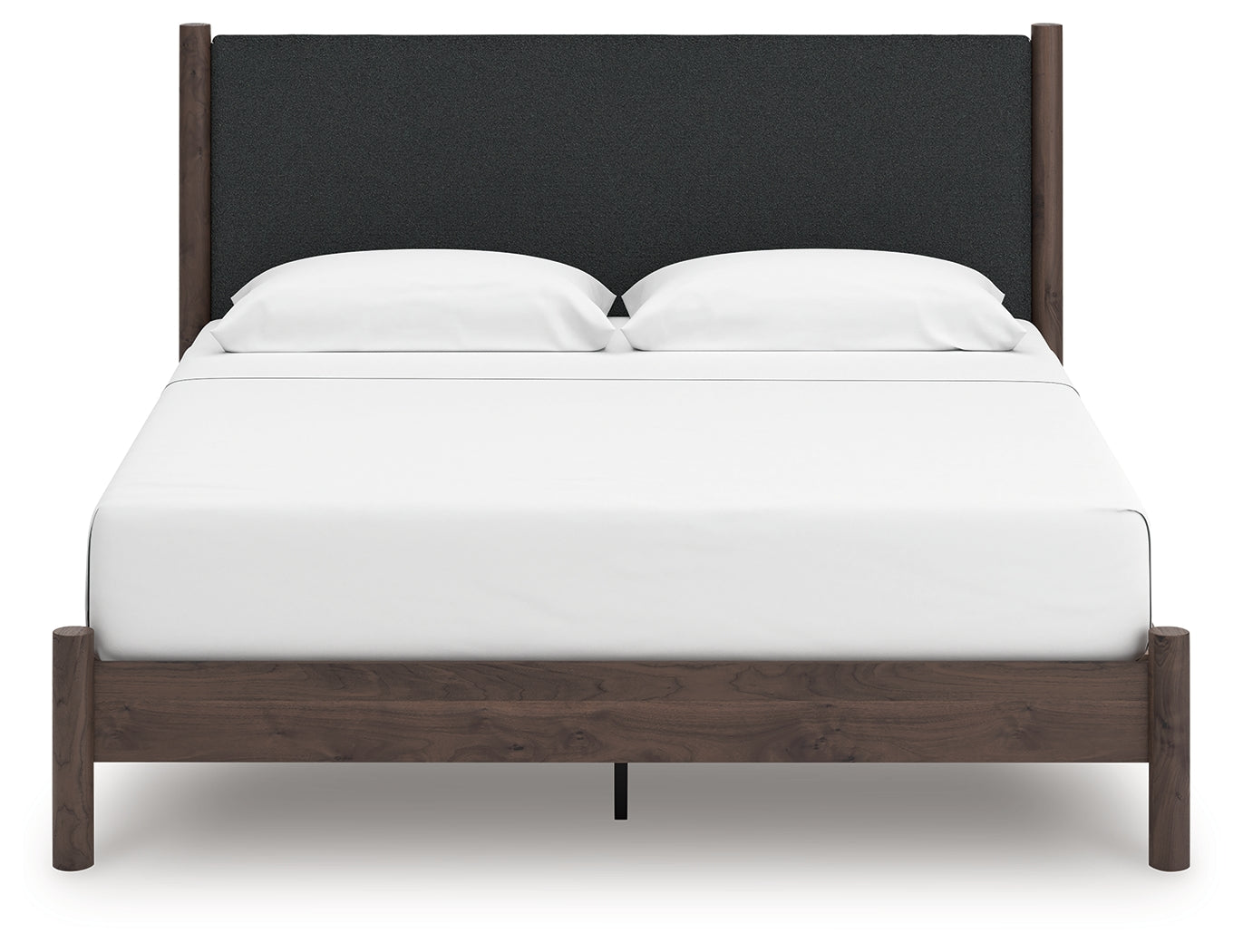 Front view of upholstered panel headboard on king bed