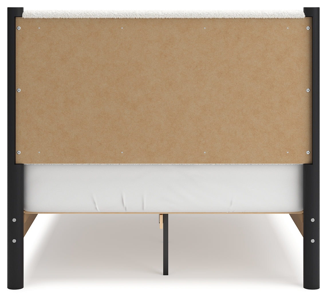 Back view of Cadmori Full Upholstered Panel Bed showing panel footboard