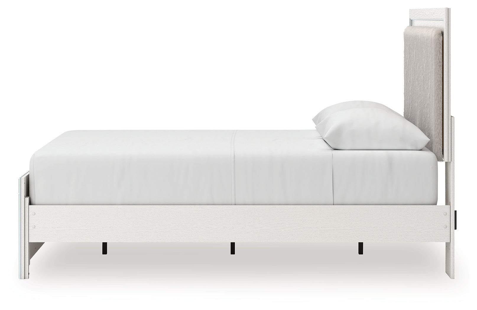 Headboard detail showing tufted upholstery