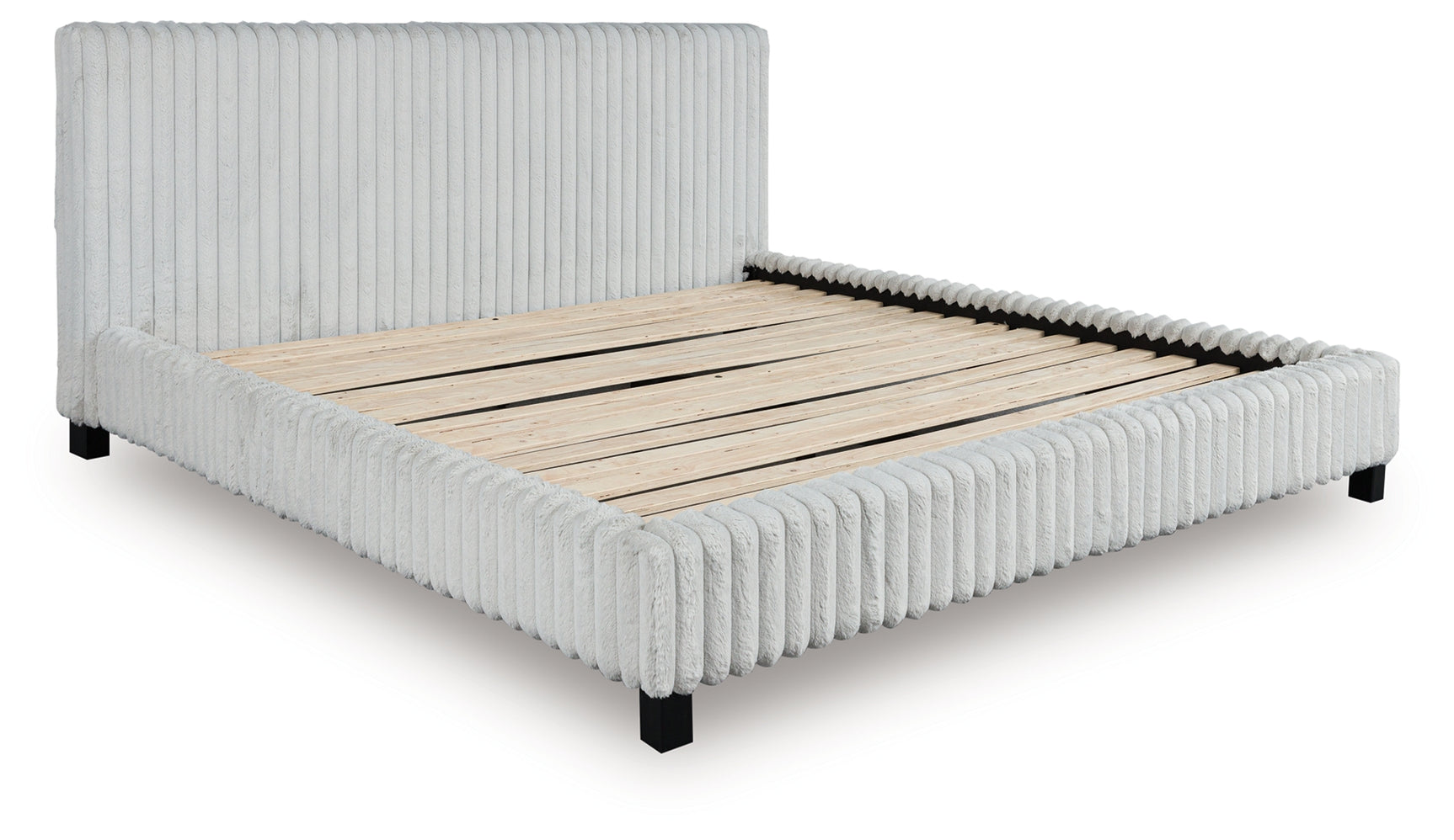 Nightstand positioned with Zuraleus White King Upholstered Bed angle view