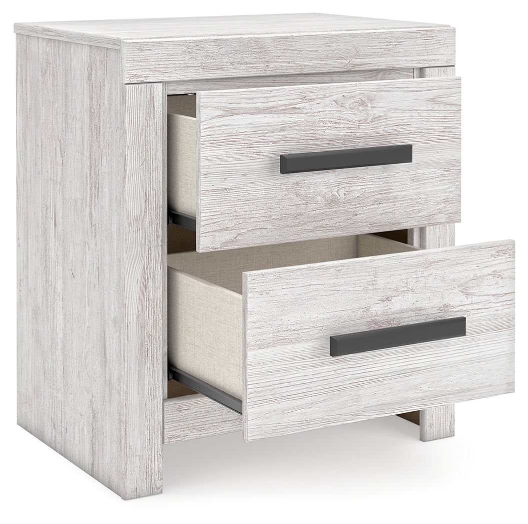 Cayboni Nightstand with one drawer open showing storage space