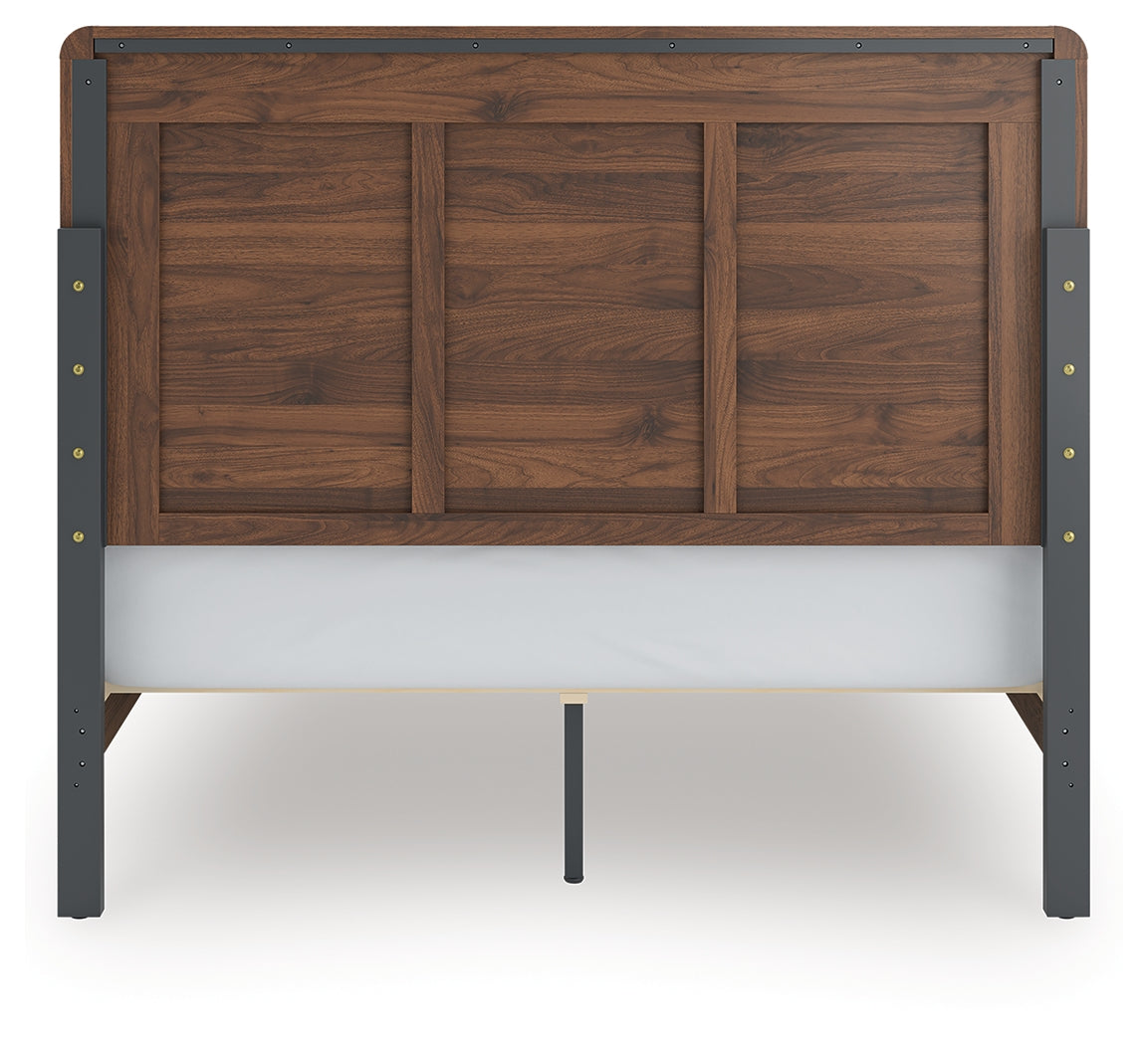 Front view of Fortlorn queen panel bed headboard