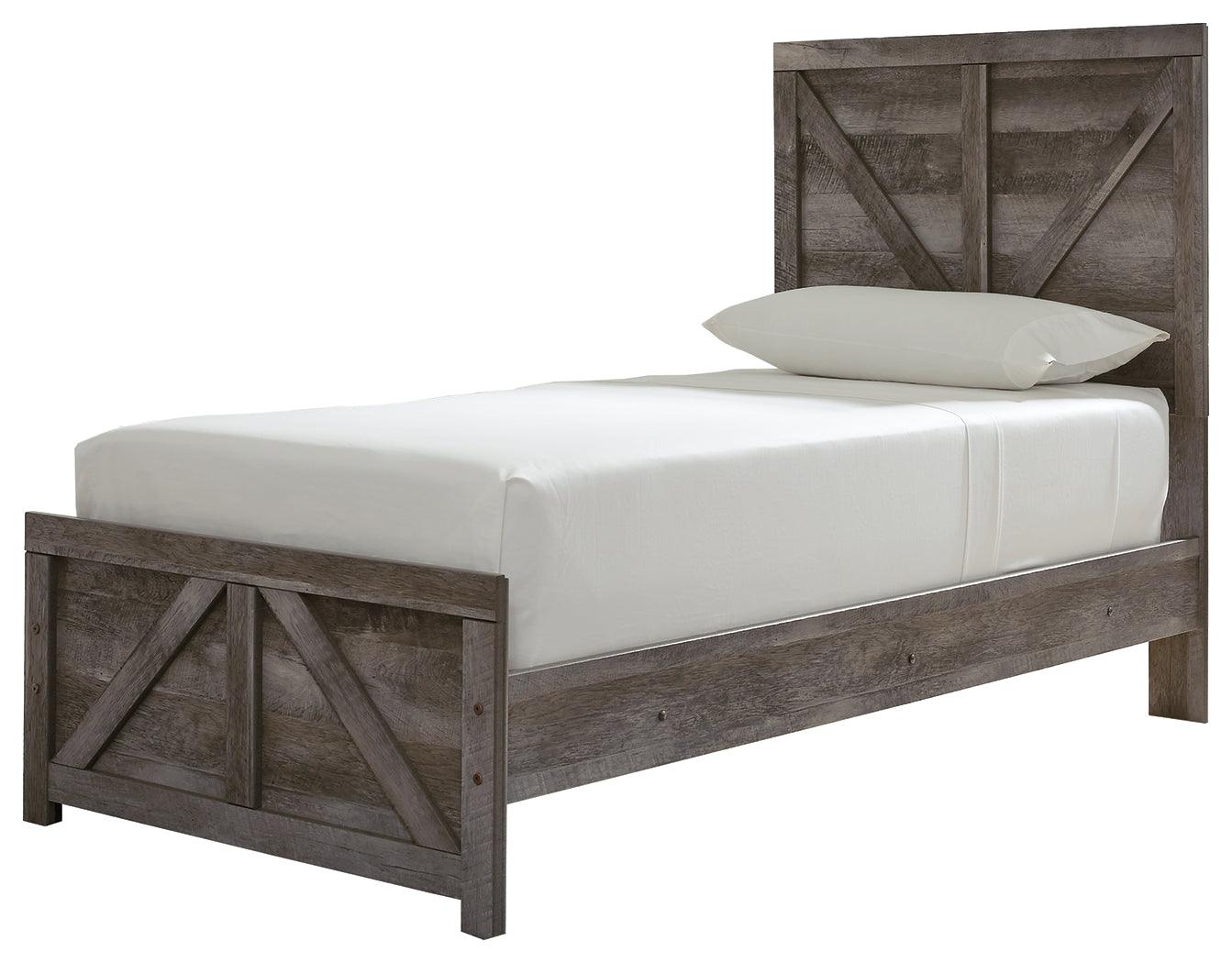 Wynnlow Gray Twin Crossbuck Panel Bed side angled view