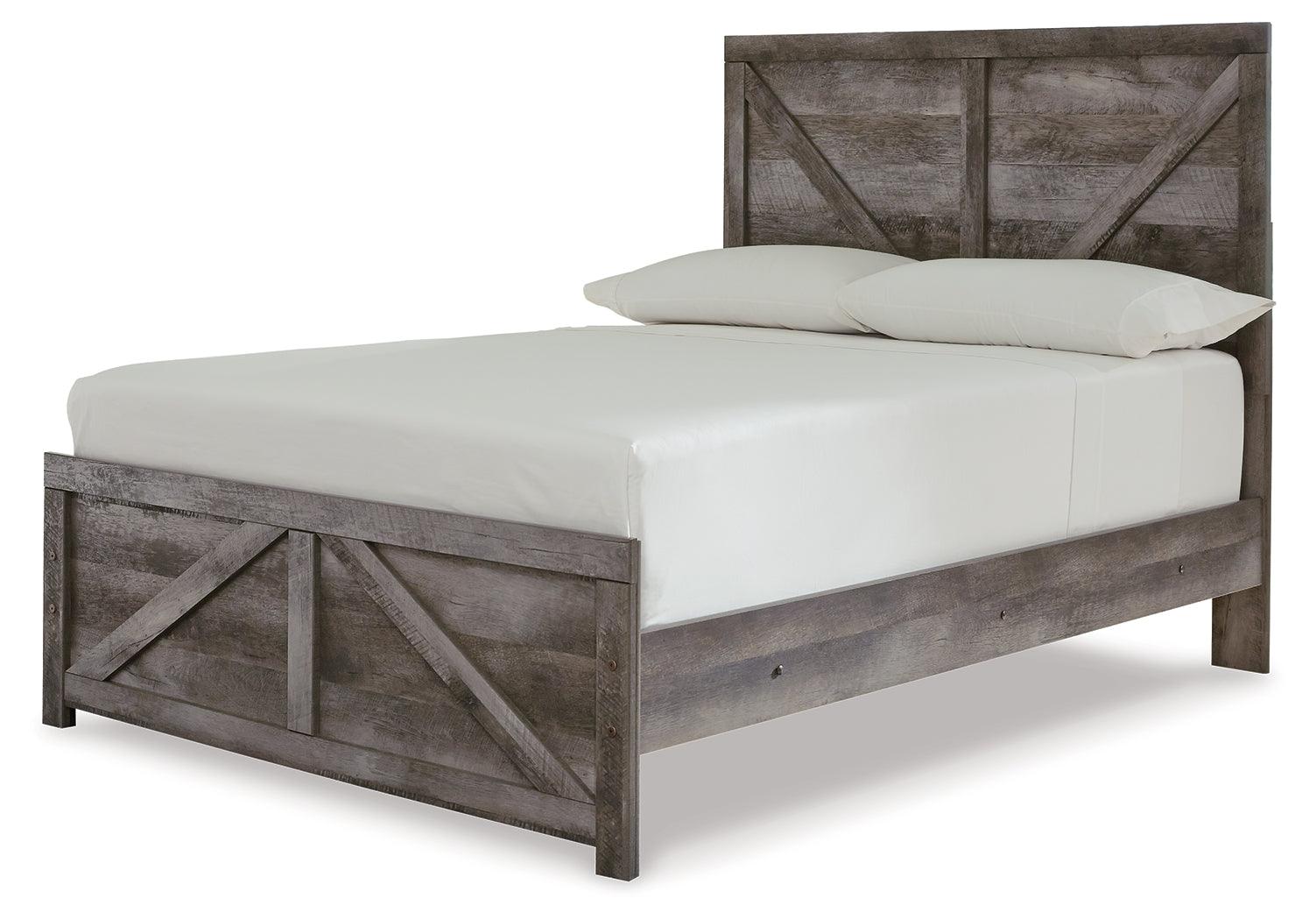 Wynnlow Gray Full Crossbuck Panel Bed angled side view
