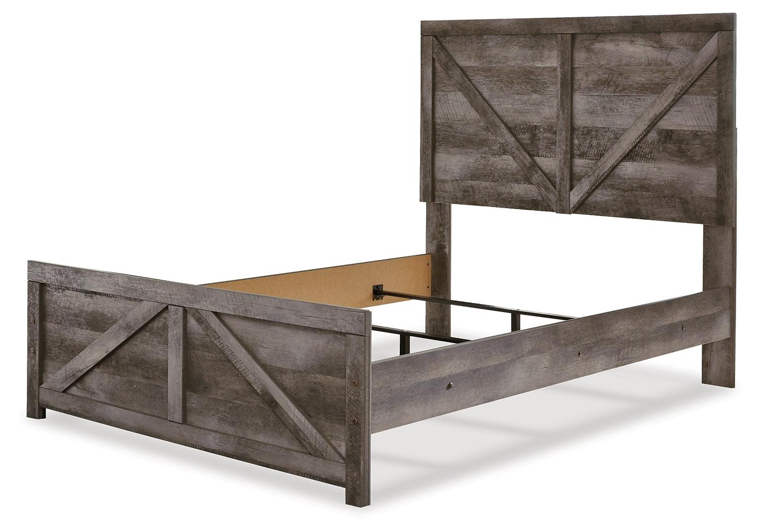 Wynnlow Gray Full Crossbuck Panel Bed angled footboard view