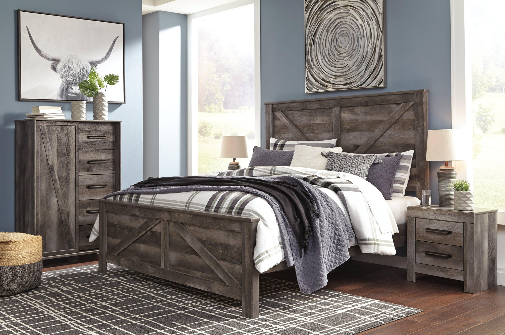 Wynnlow Gray King Crossbuck Panel Bed angled perspective