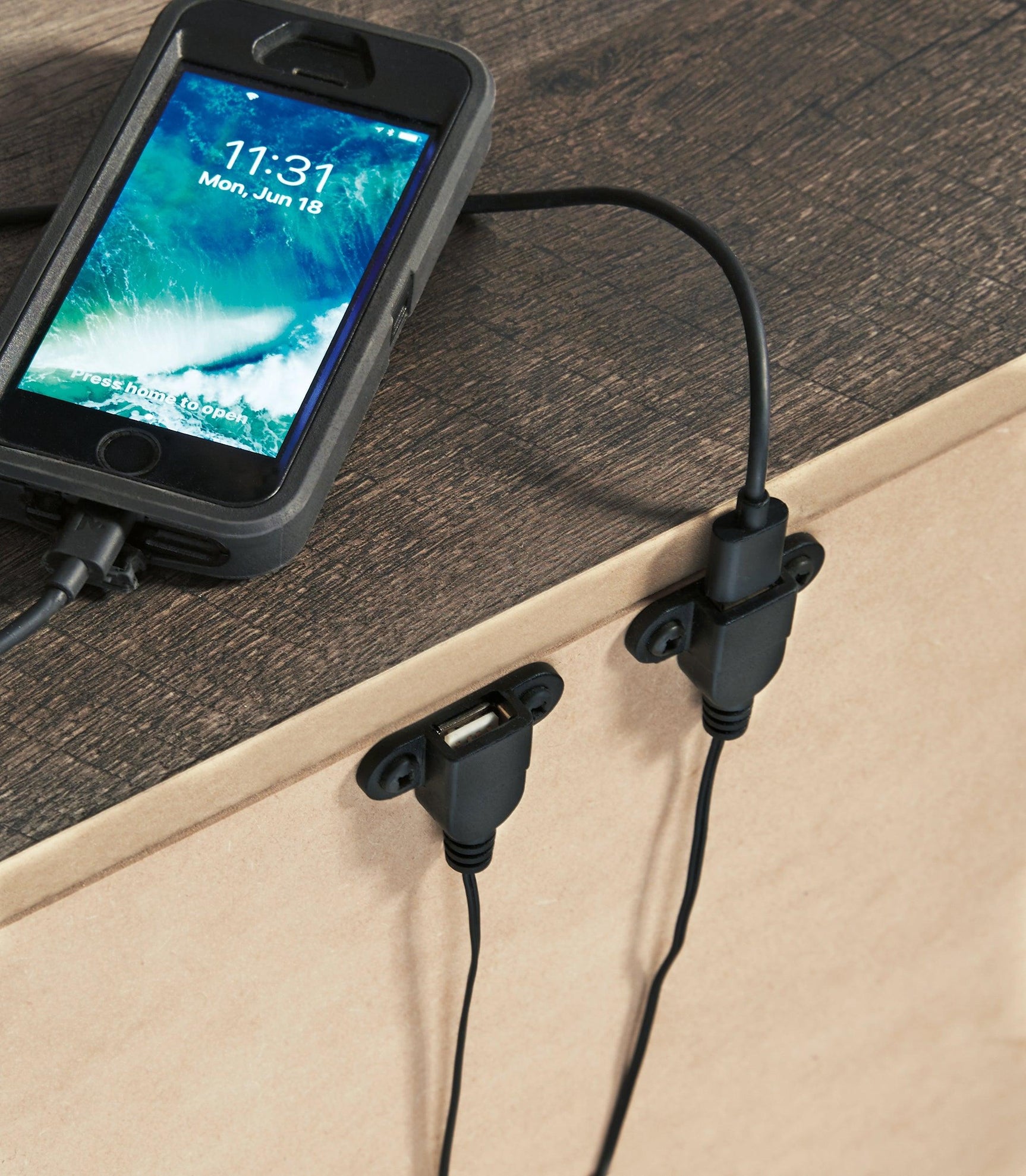 Close-up of dual USB charging ports on Wynnlow Gray Nightstand