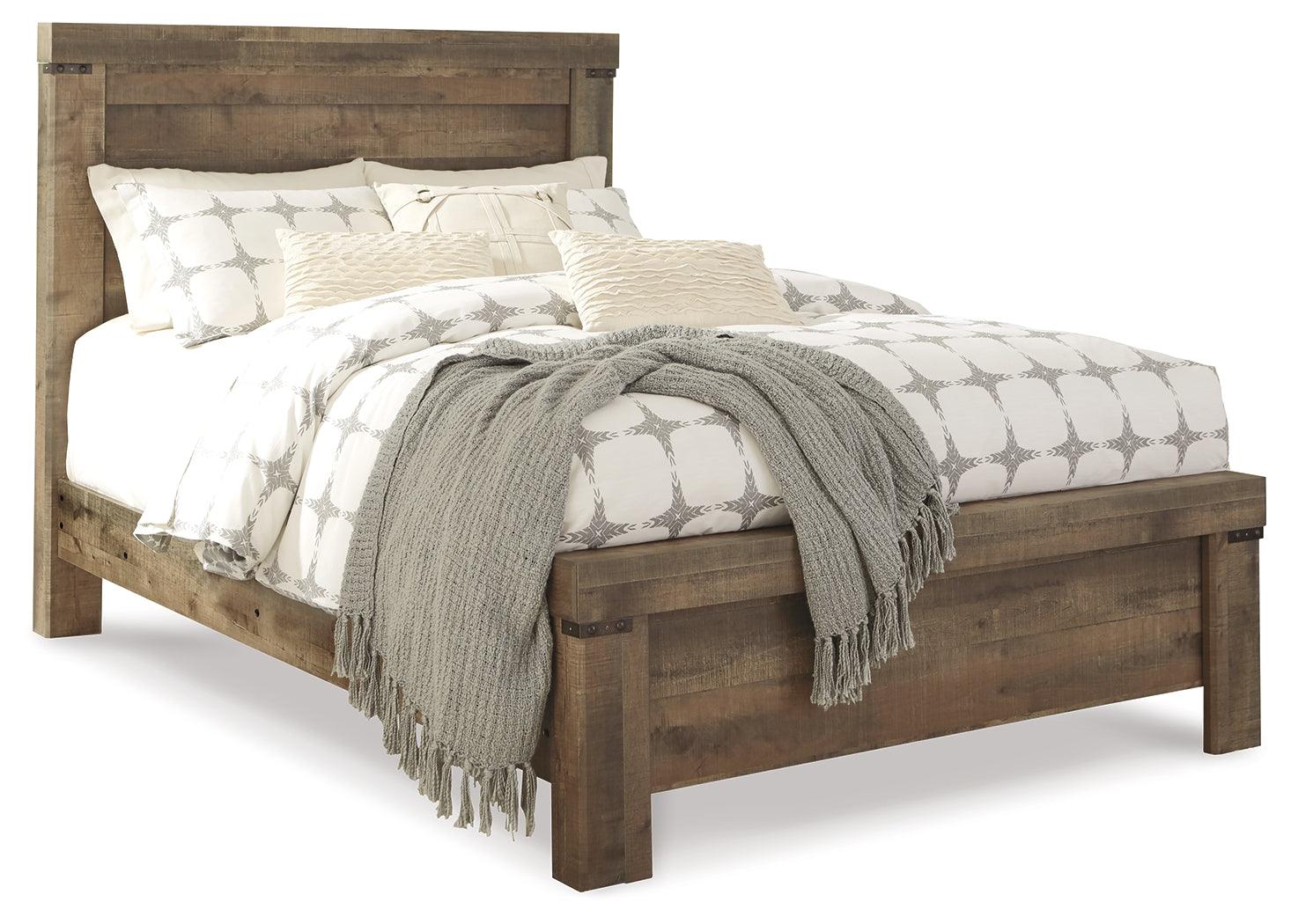 Trinell Brown Queen Panel Bed angled corner detail