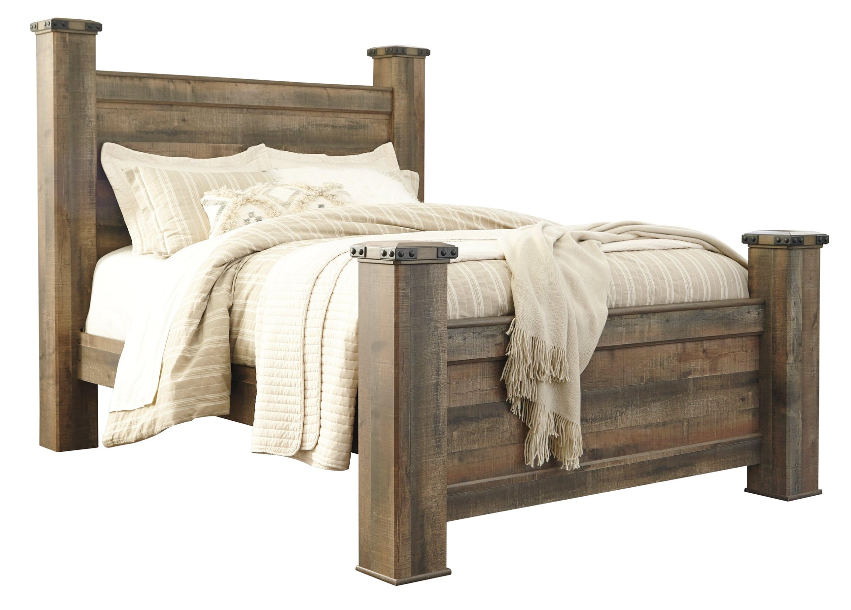 Side angle showing padded upholstered headboard of Trinell Queen Poster Bed