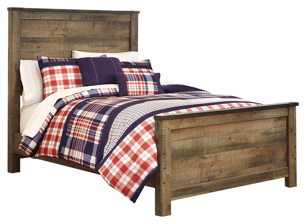 Detailed view of nailhead accents on Trinell Bed headboard