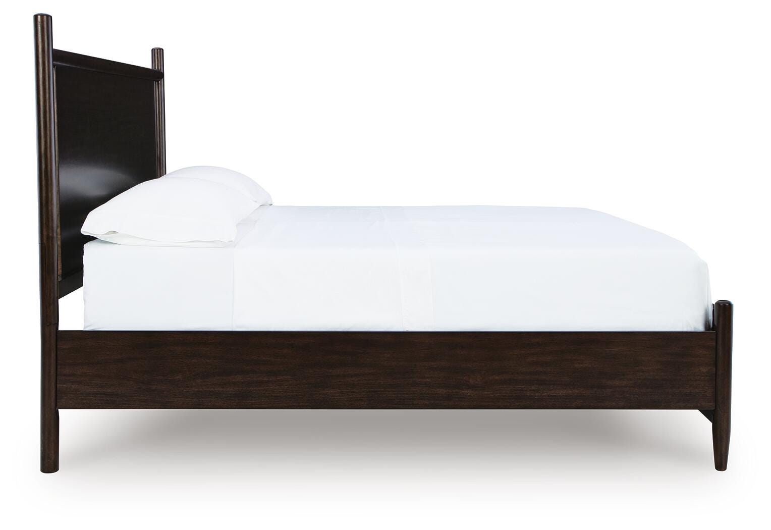 Side angle showing tapered legs of Dantenton King Panel Bed