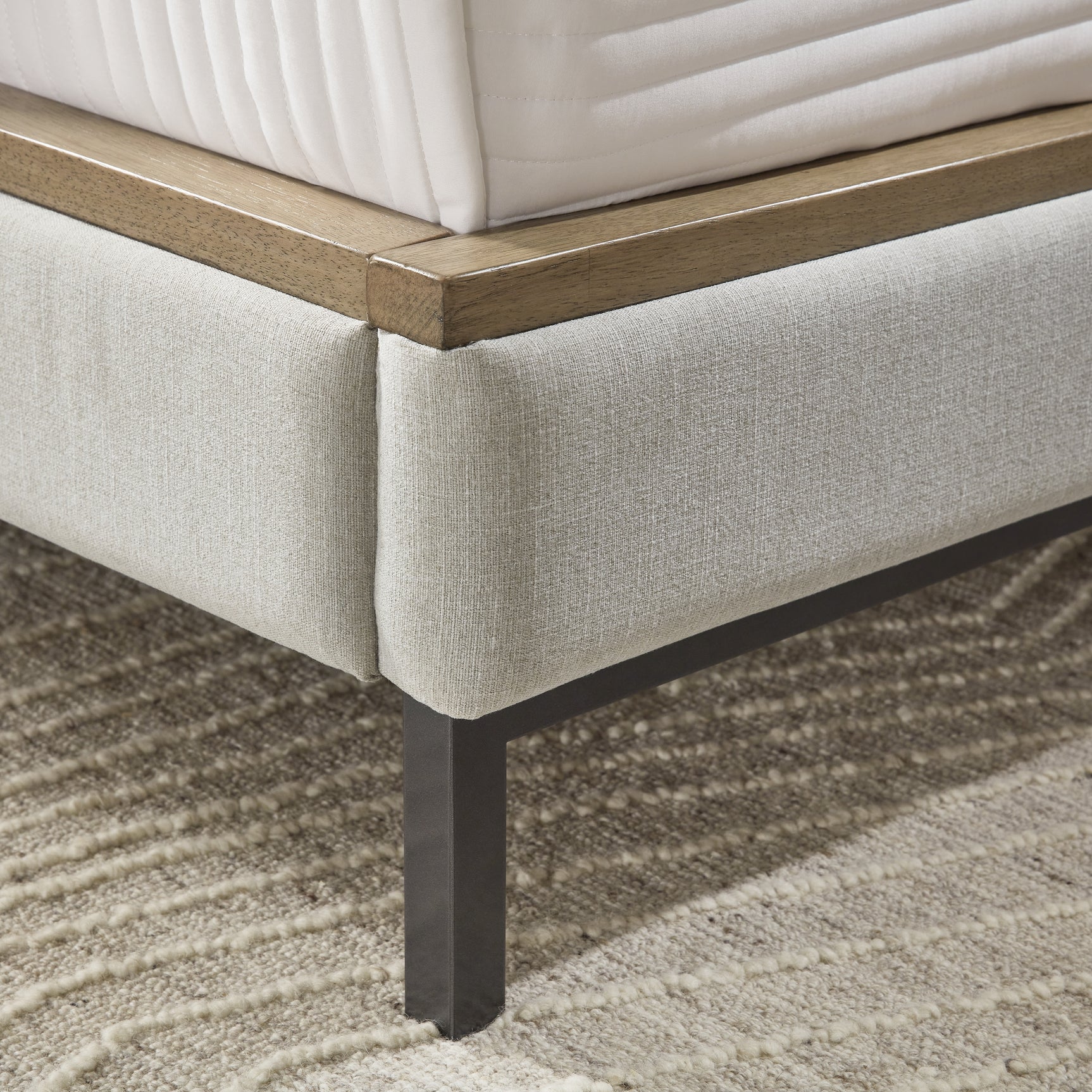 Close-up of footboard metal leg finish
