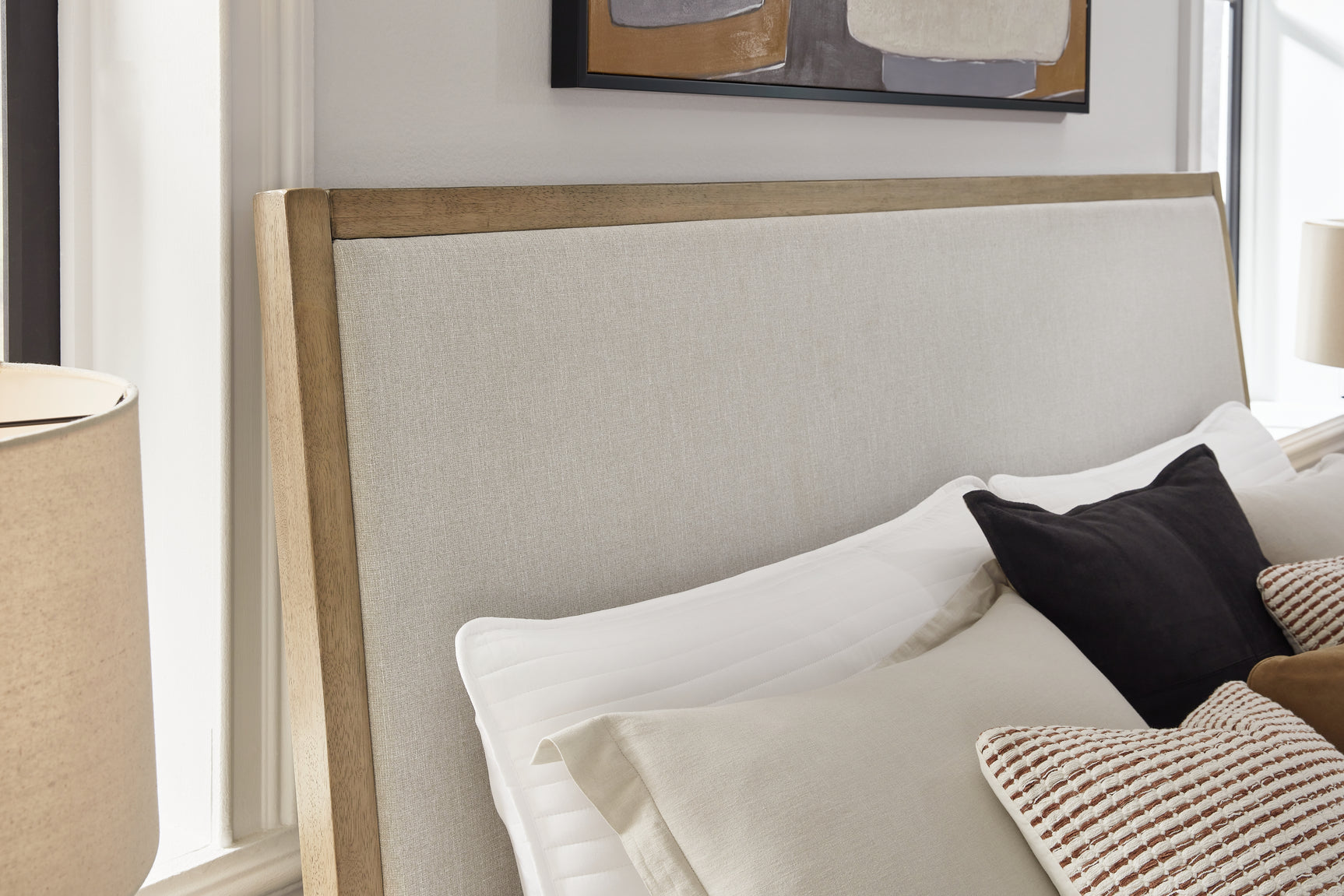 Detail of fabric upholstery and foam cushioning on headboard