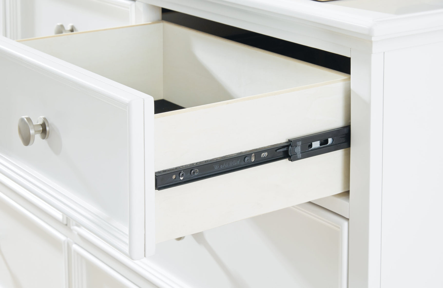 Close-up of dovetail drawer glide in Fortman dresser