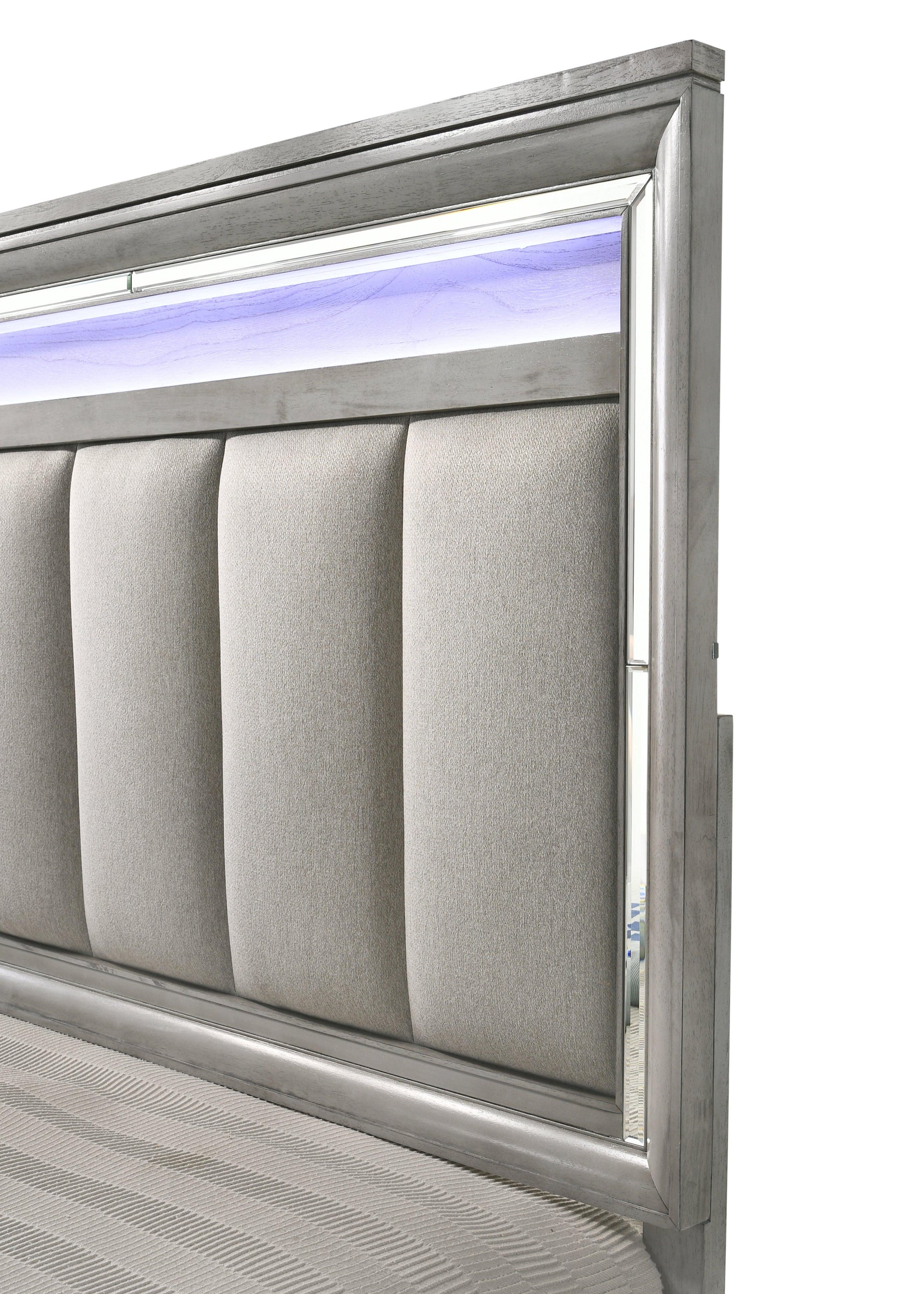 bedroom view of Vail Gray LED Upholstered Panel Bedroom Set dresser and mirror