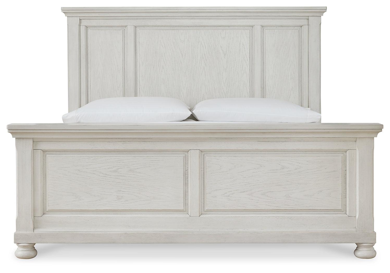 Close-up of carved headboard and grain texture on Robbinsdale King Panel Bed