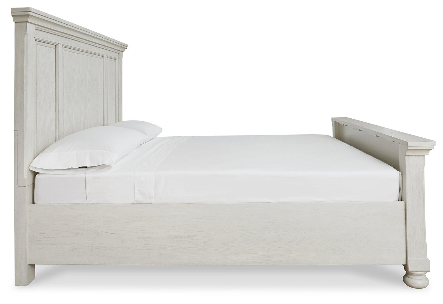 Side profile of Robbinsdale Antique White King Panel Bed