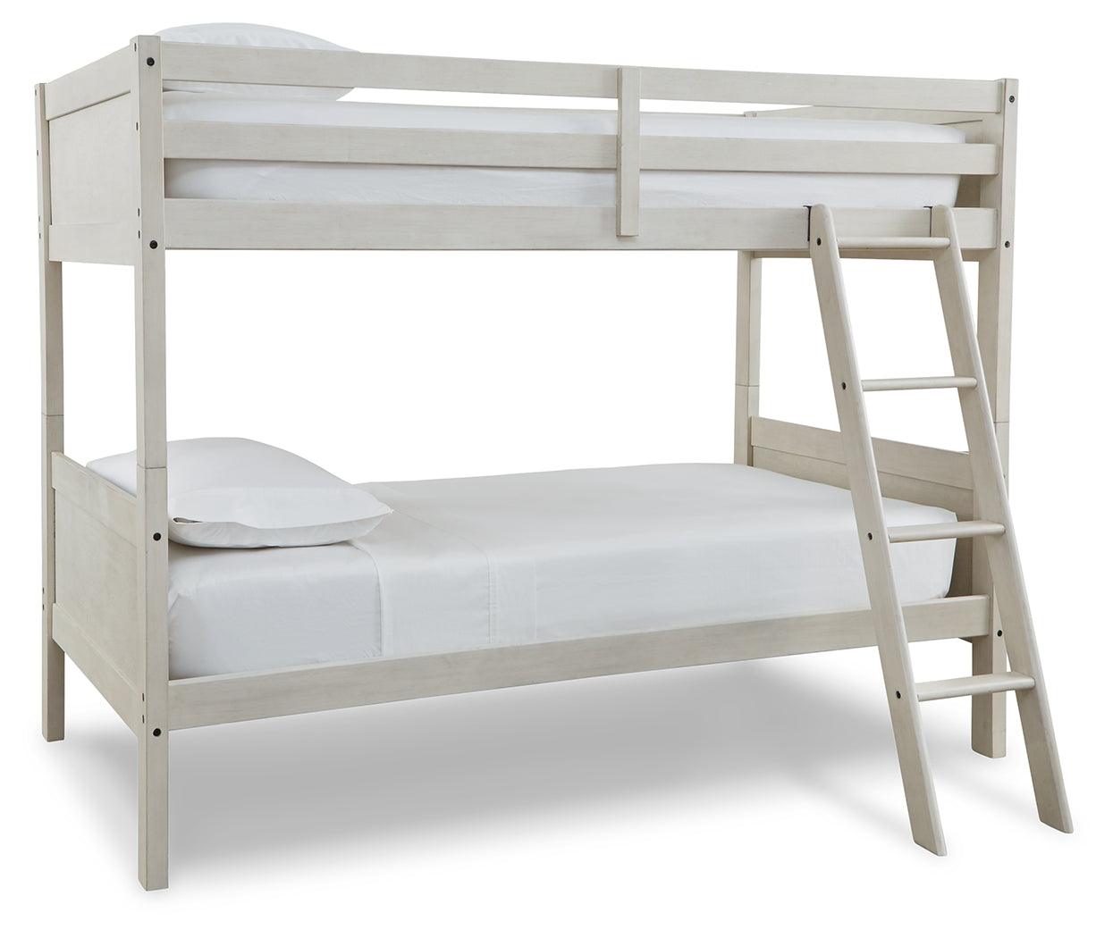 Side view of Robbinsdale Antique White Twin-Over-Twin Bunk Bed