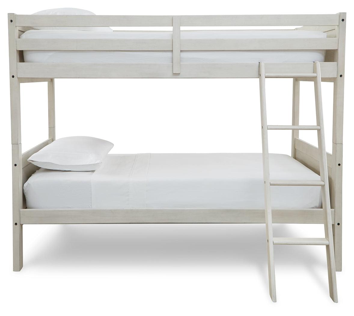Ladder detail on Robbinsdale Antique White Twin-Over-Twin Bunk Bed