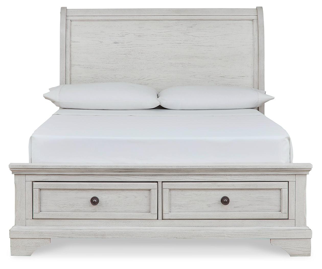 Robbinsdale Antique White Full Sleigh Storage Bed footboard and storage drawers