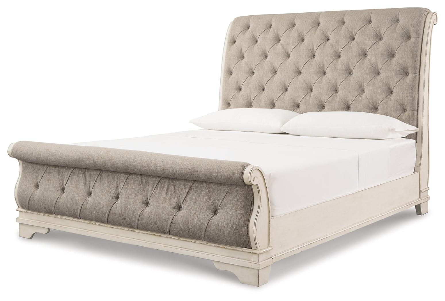 Realyn Chipped White King Upholstered Sleigh Bed side view