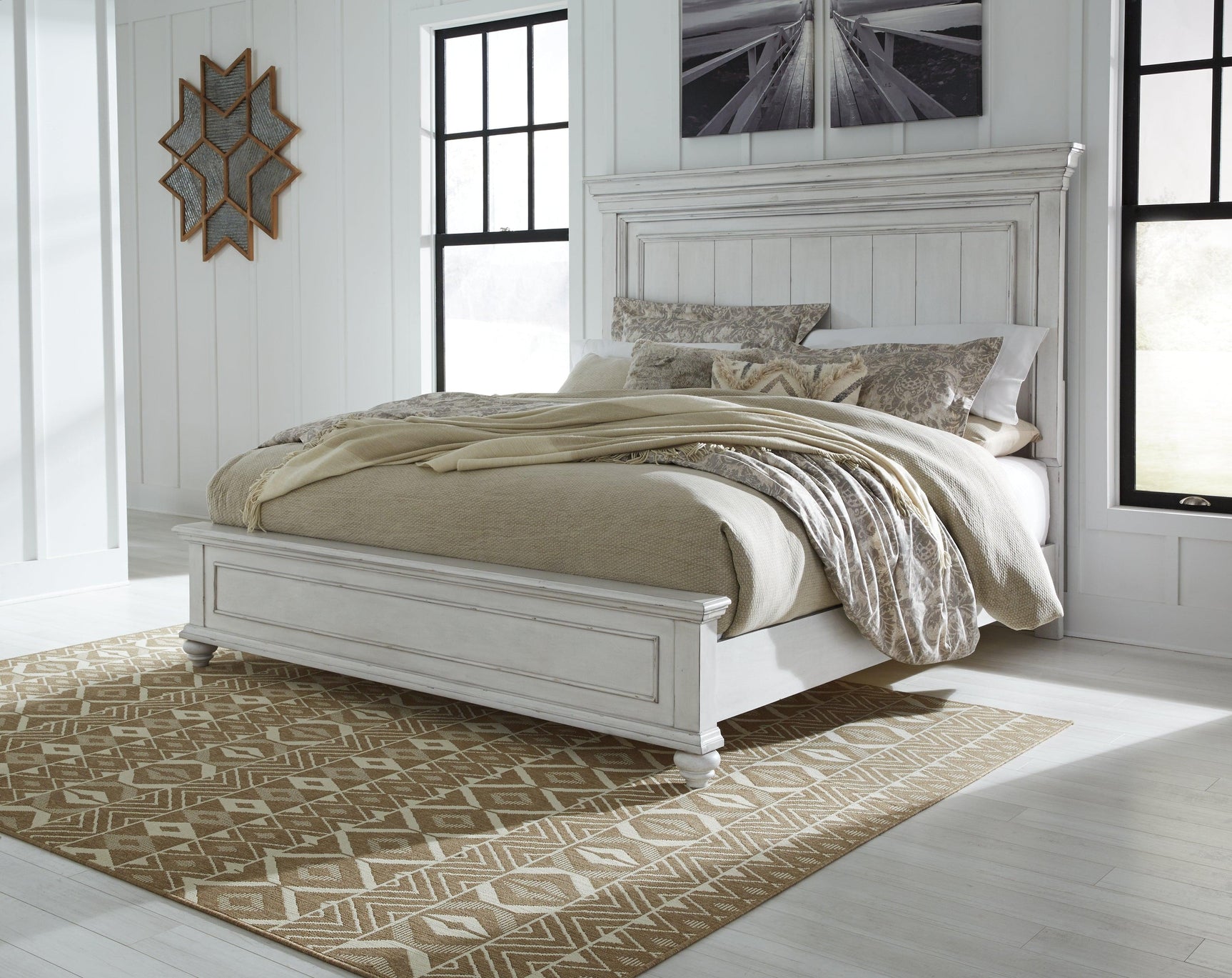 Kanwyn Whitewash Queen Panel Bed styled in bedroom setting