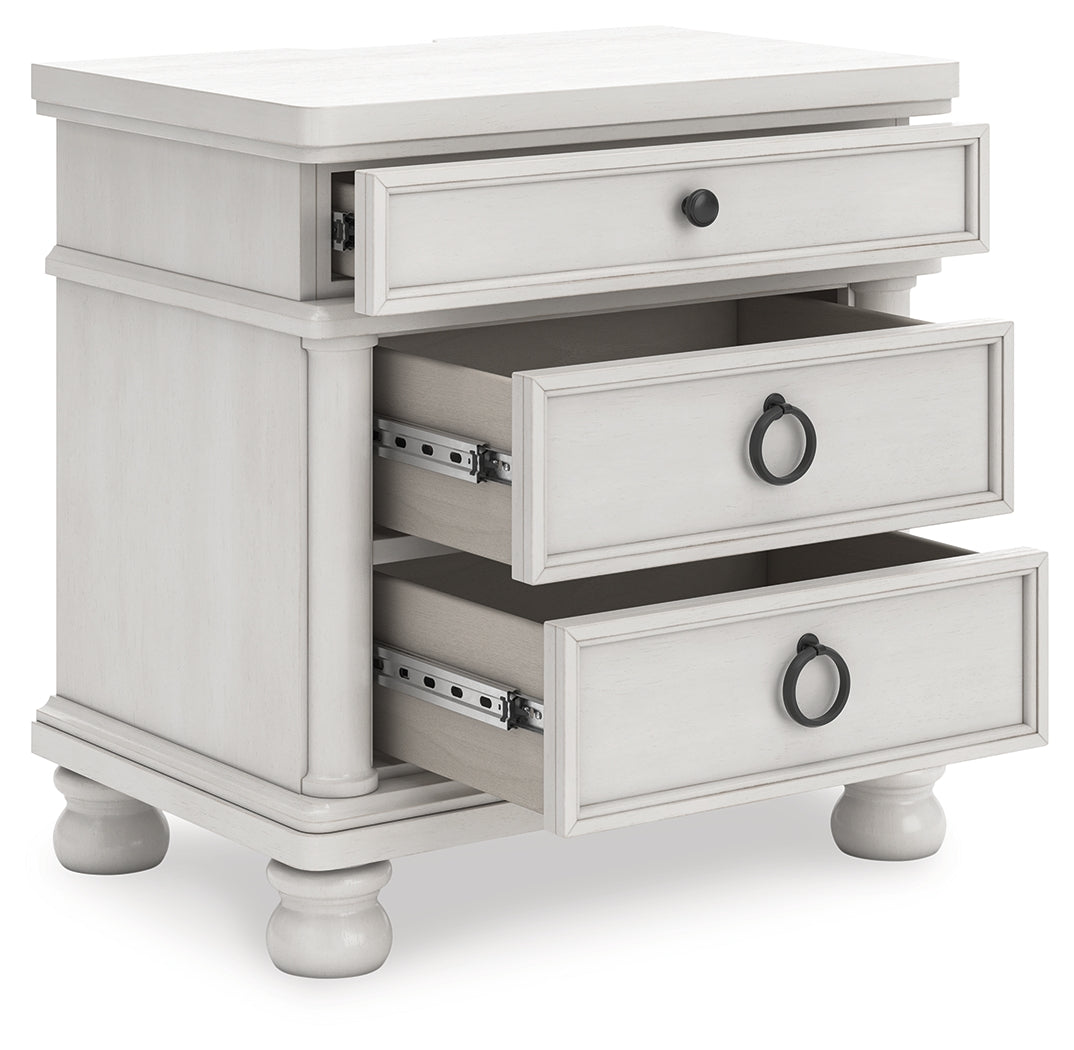 Rowlenstown Nightstand angled open drawers showing interior
