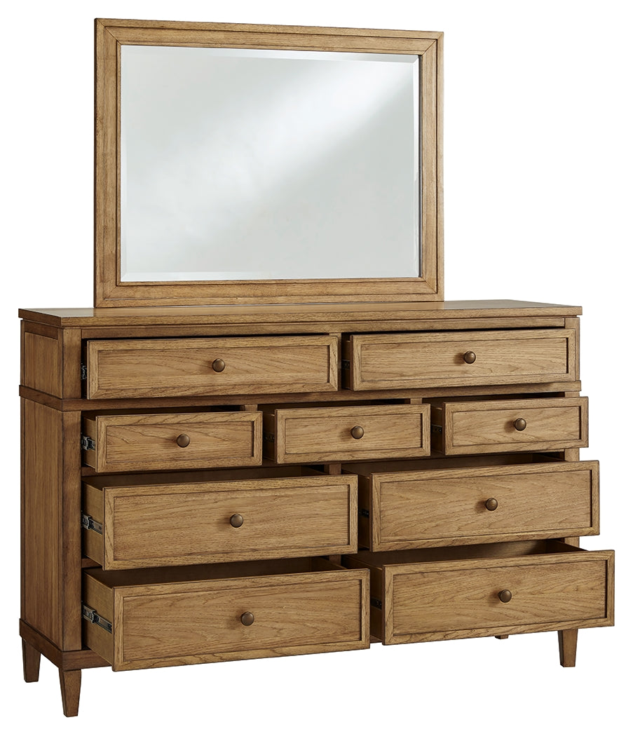 Open drawer showing felt-lined top drawer in Sharlance dresser