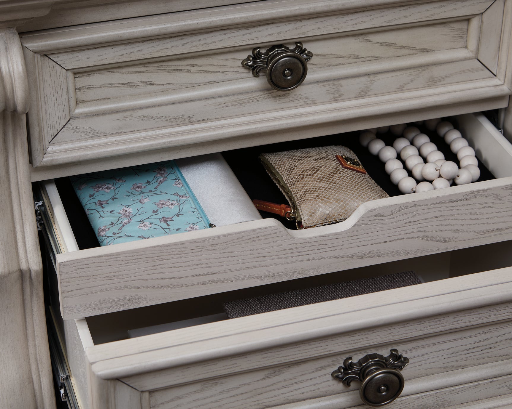 Bruchandi nightstand hardware detail with bronze-tone pulls