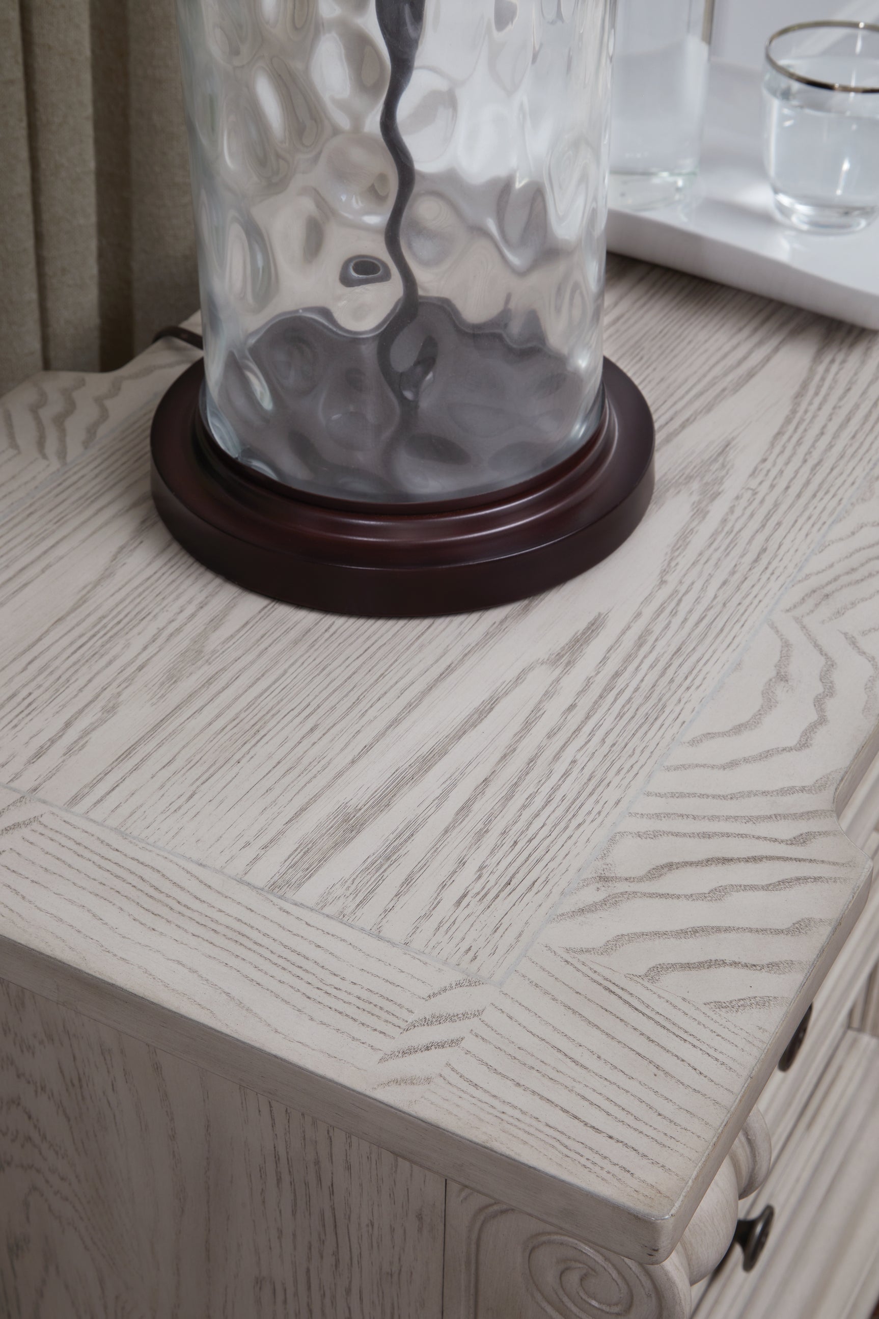 Bruchandi nightstand top detail with walnut inlay
