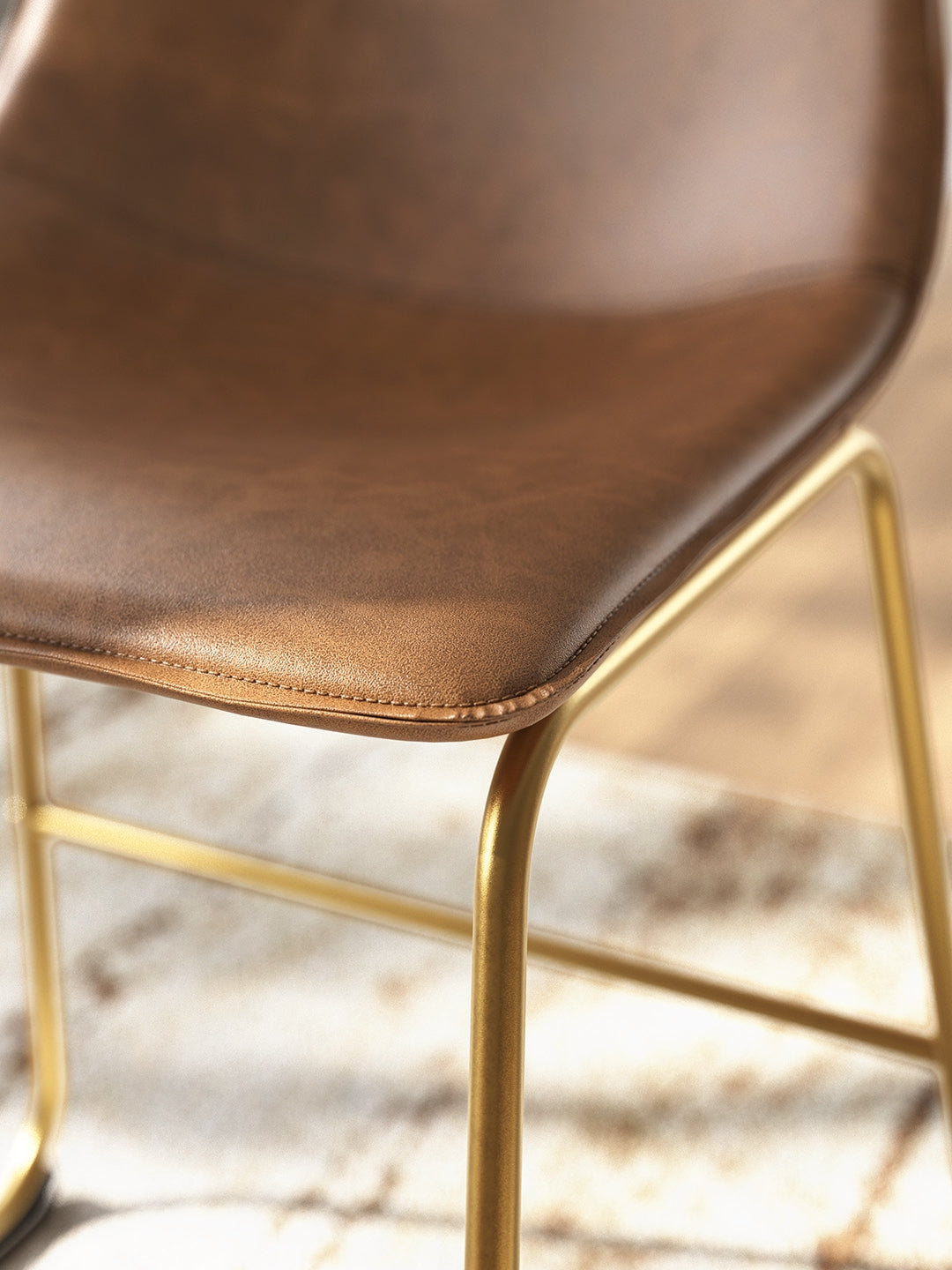 Detailed view of goldtone metal frame finish