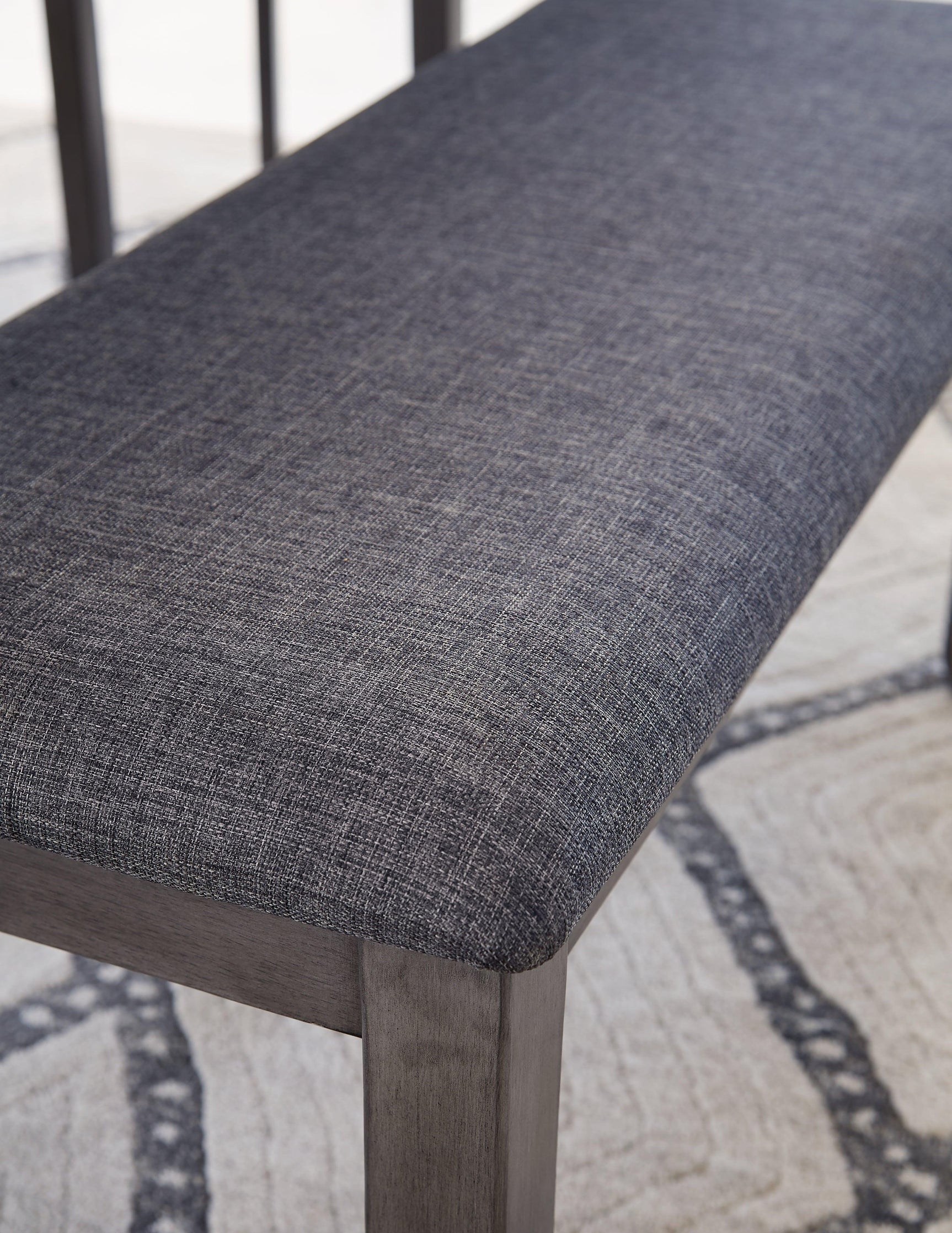 Close-up of Bridson upholstered bench seating in gray