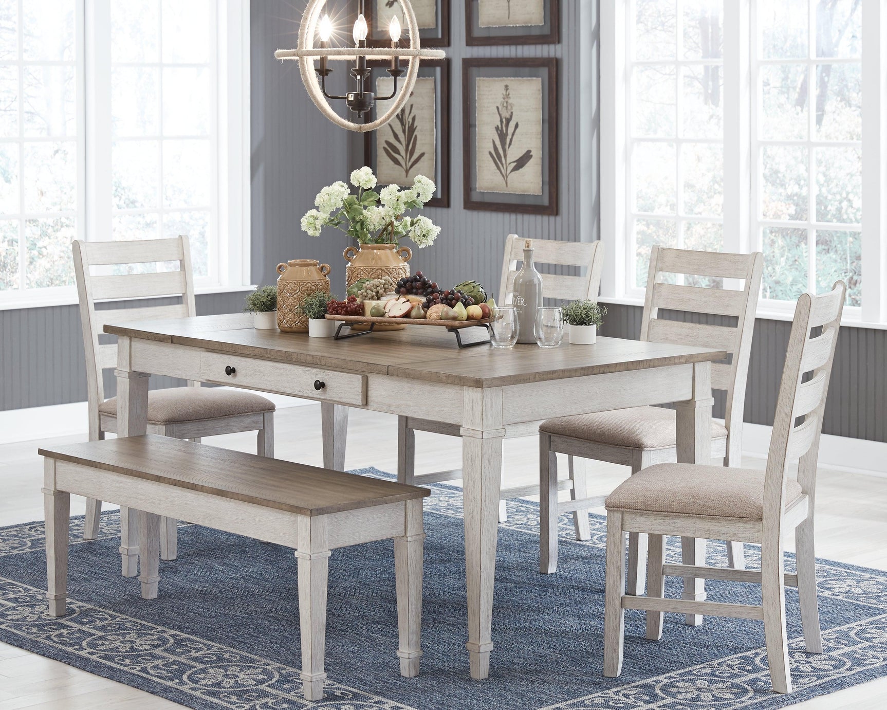 Skempton dining table showing distressed white base