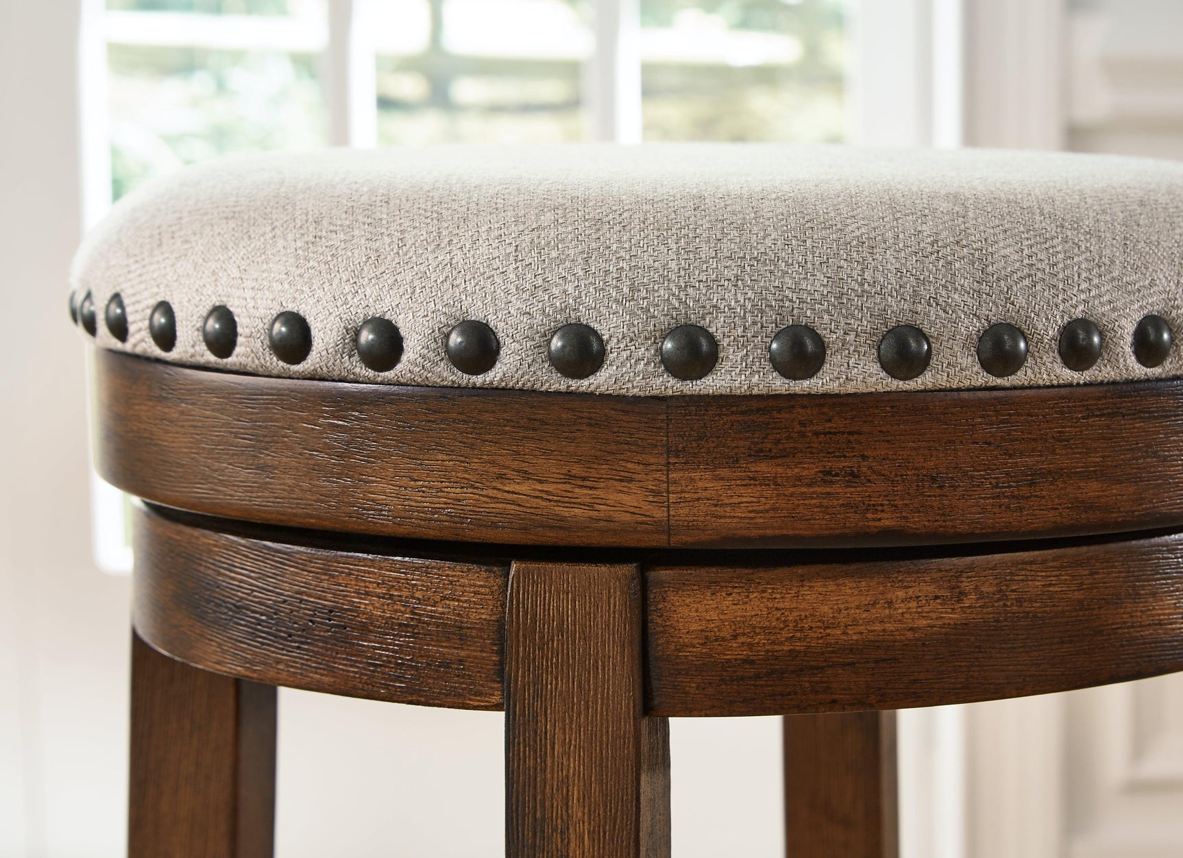 Close-up of rustic brown finish on wood frame