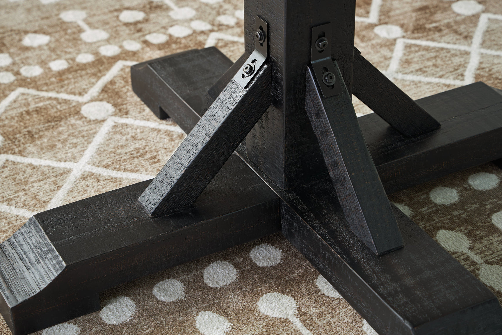 Pedestal base detail with sturdy post and bracket design