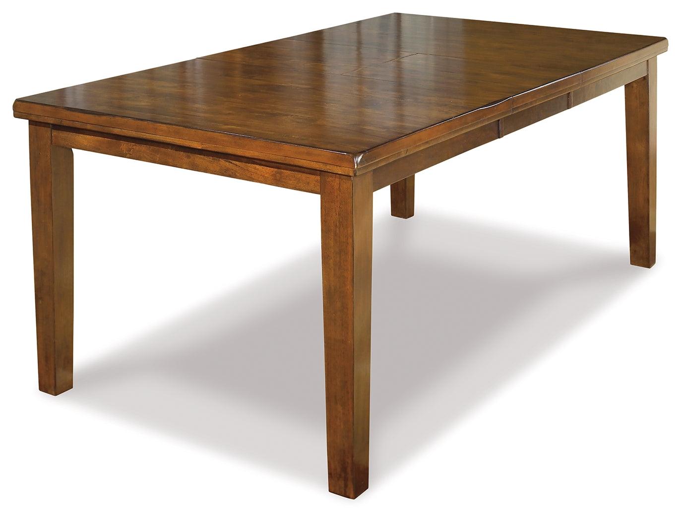 Close-up of Ralene Dining Table corner and wood finish