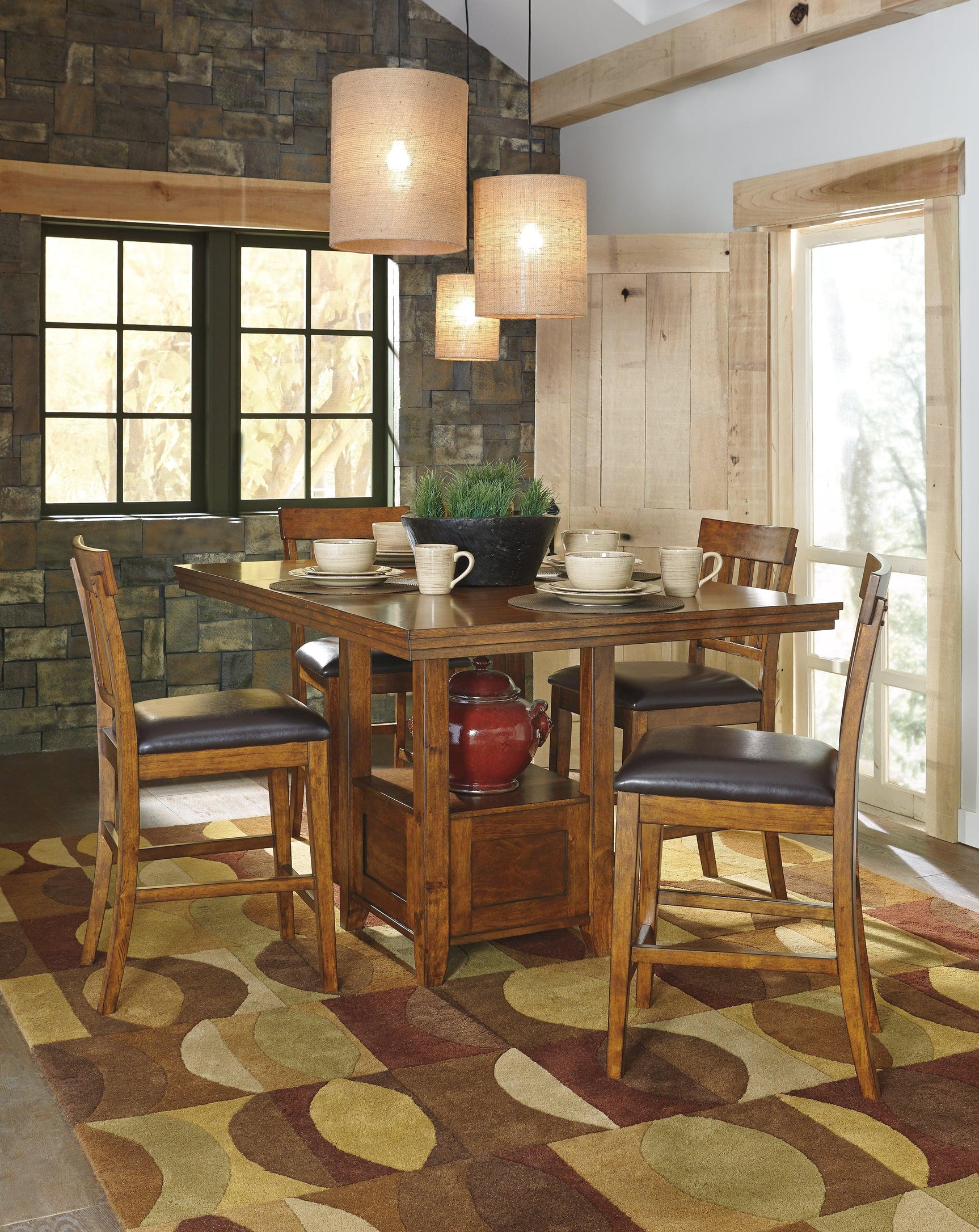 Table setup featuring Ralene Medium Brown Counter Height Bar Stool