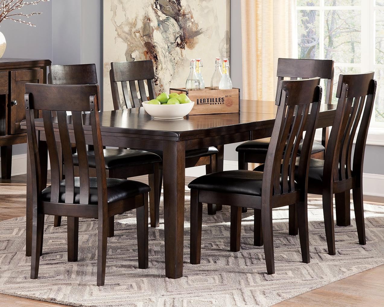 Haddigan dining extension table angled side view in dark brown finish