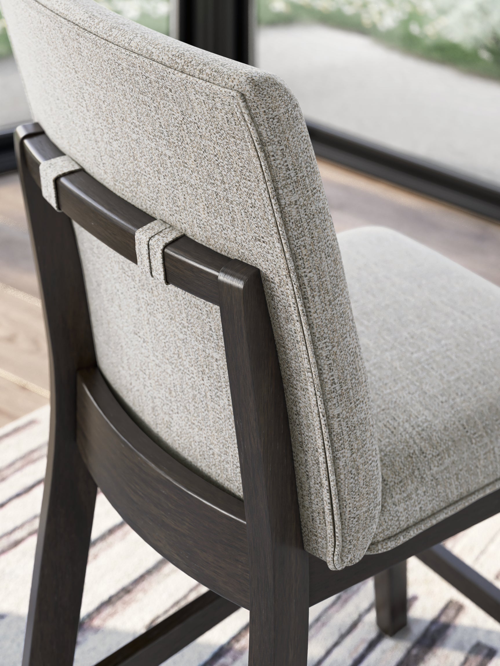 Neymorton Dark Grayish Brown Counter Height Swivel Barstool front angle