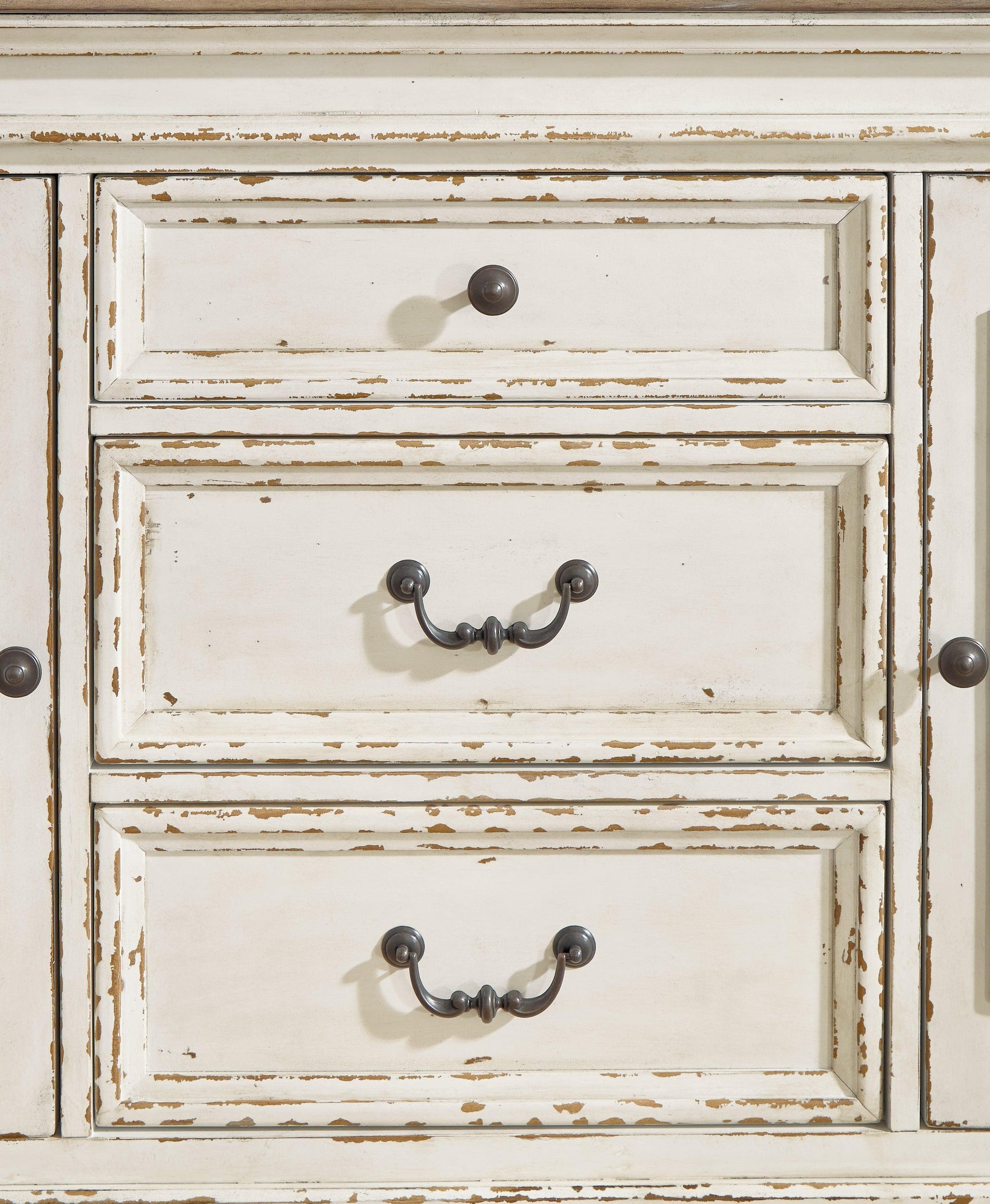 Closeup of dark bronze bail pulls and knobs on Realyn Dining Server