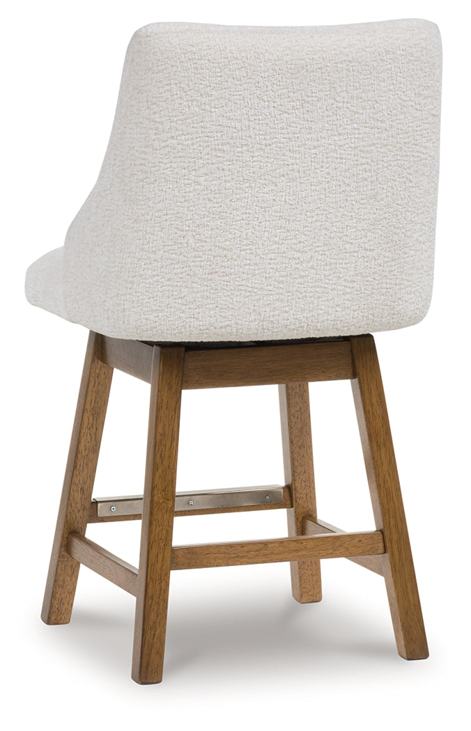 Cabalynn counter height barstool in oatmeal fabric and light brown wood finish