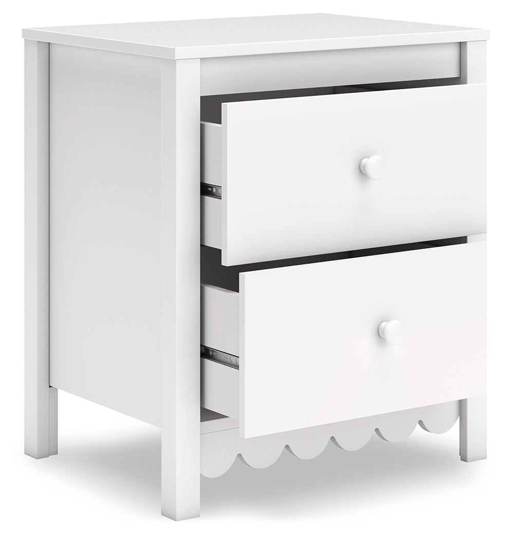 Hallityn Nightstand angled with top drawer open showing storage space