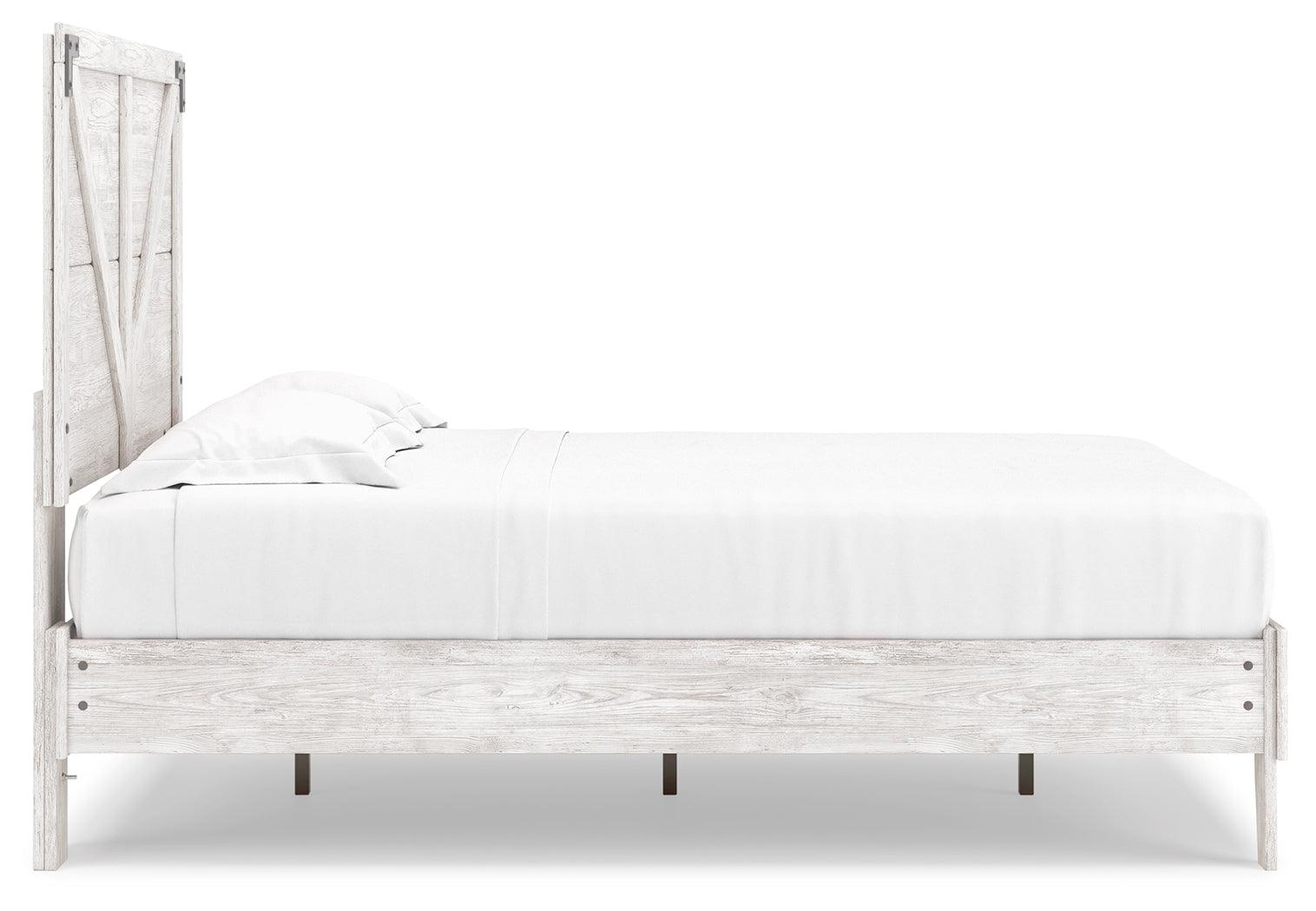 Detail of crossbuck panel and pewter-tone hardware on Shawburn bed in white and charcoal gray