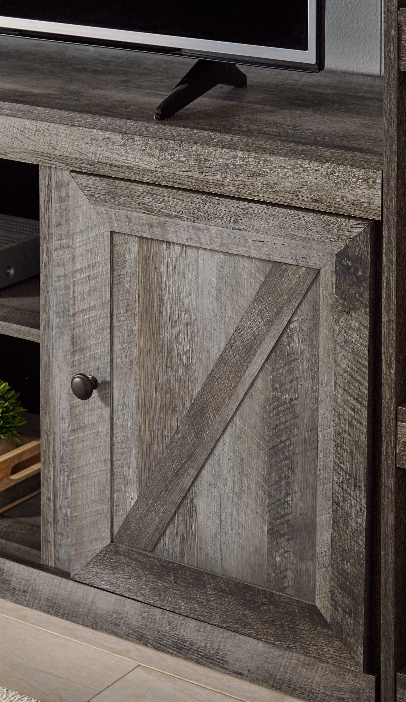 Wynnlow Gray 60 inch TV stand close-up of finish texture