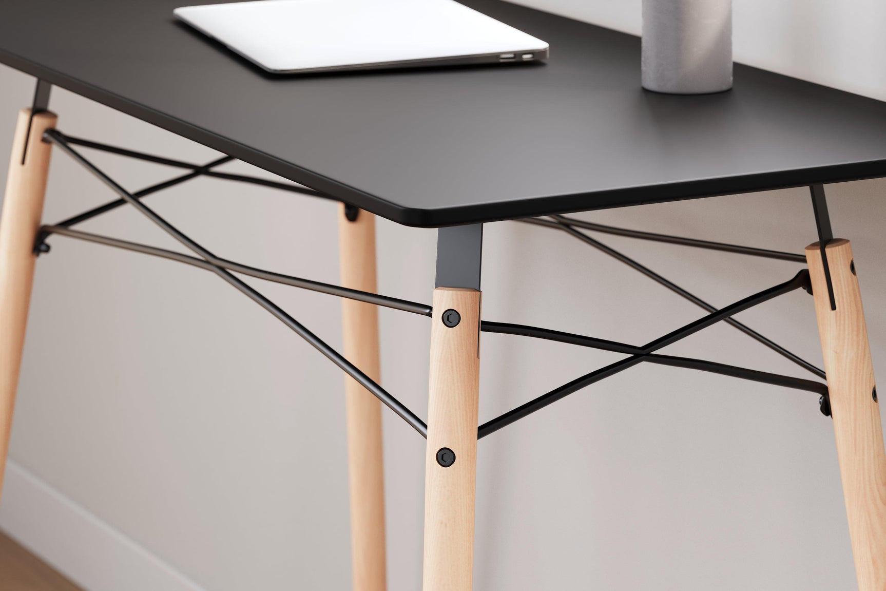 Jaspeni Black and Natural Wood Home Office Desk showcasing natural wood legs