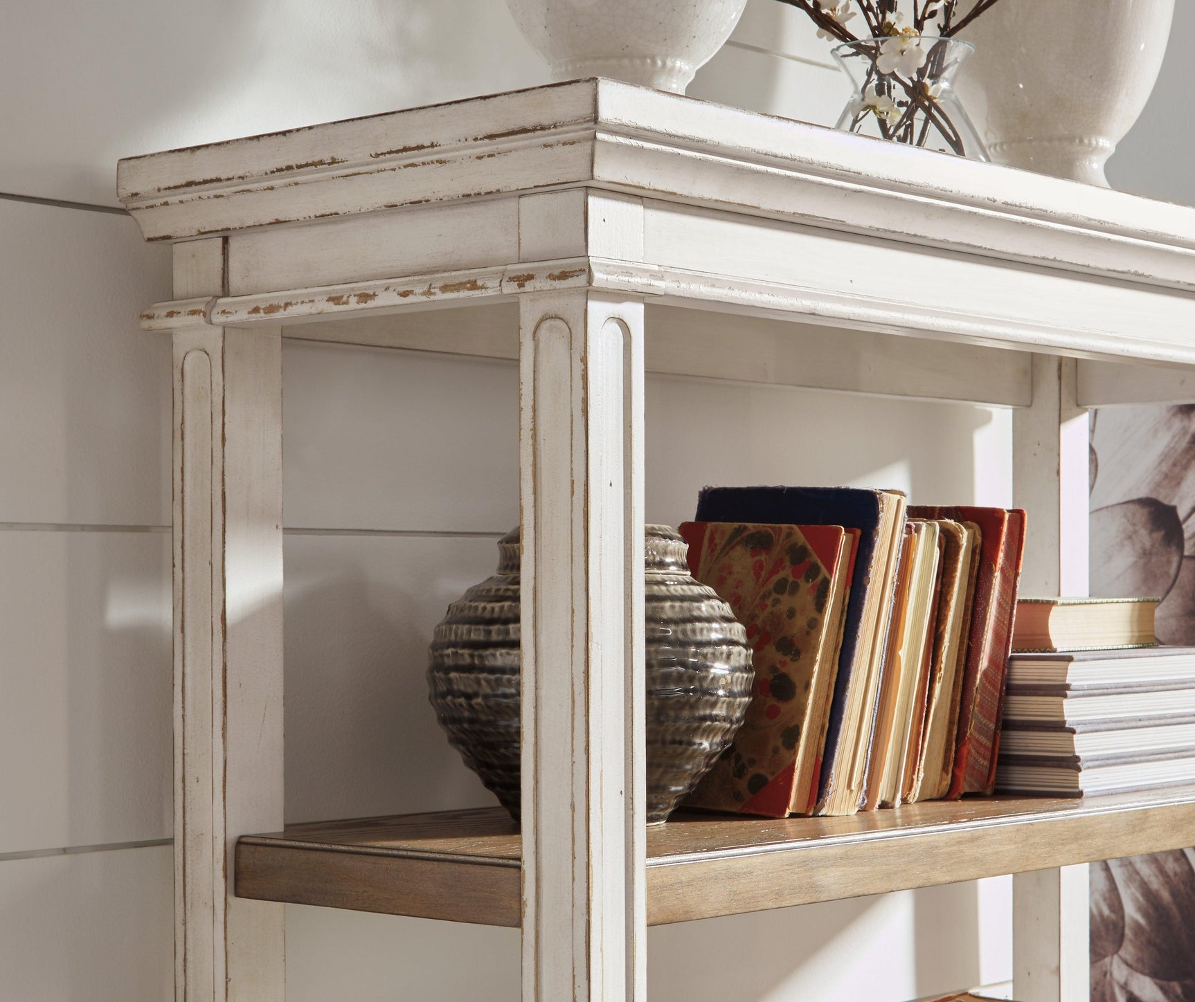 Realyn brown and white bookcase close-up detail