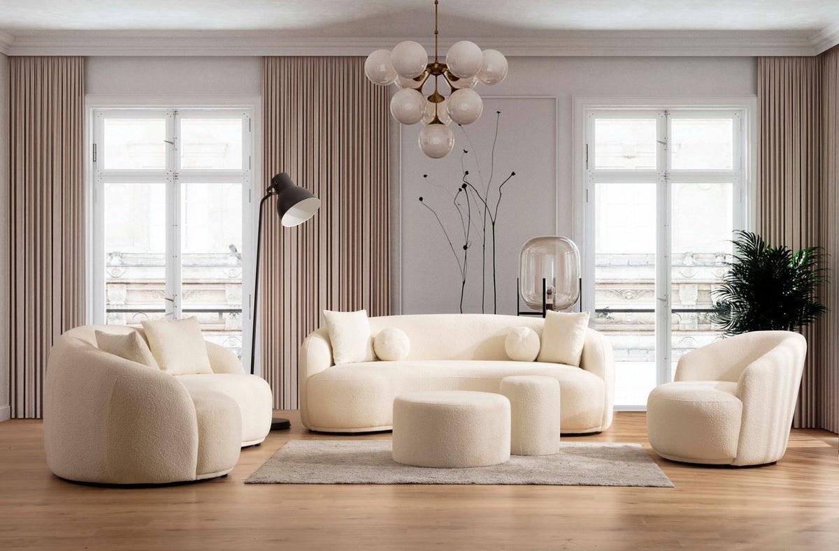 Ivory boucle round ottoman in living room setting