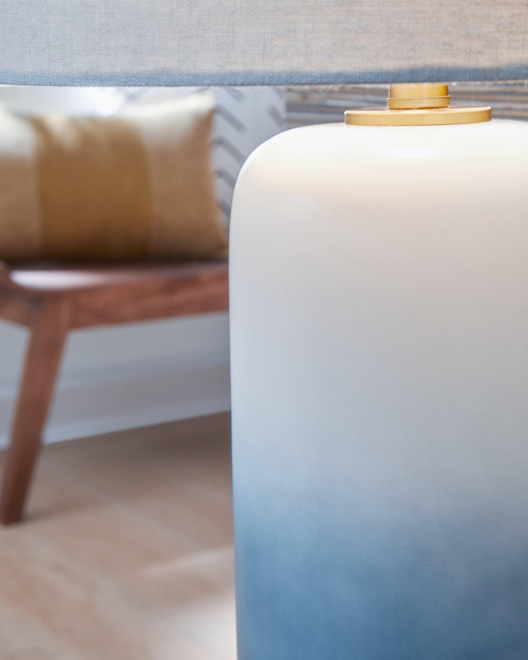 Side view of Lemrich table lamp highlighting color gradation and design