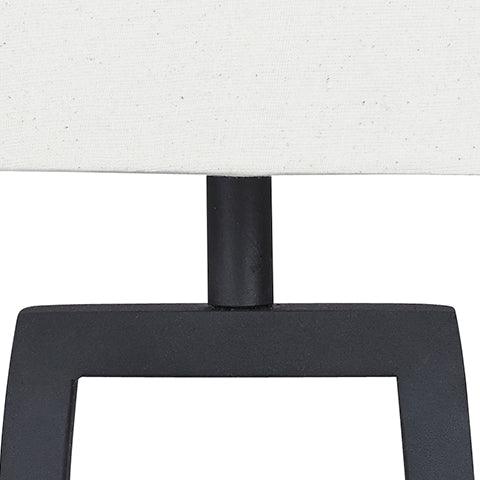 Close-up of Makara Table Lamp black metal and brown wood finish